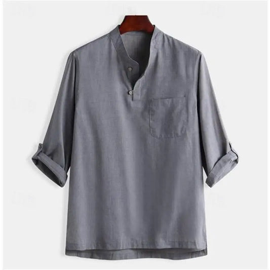 A linen casual shirt in a plain Hawaiian style with long sleeves and a henley neckline.